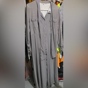 Black and white striped long sleeve maxi dress. Brand new without tags